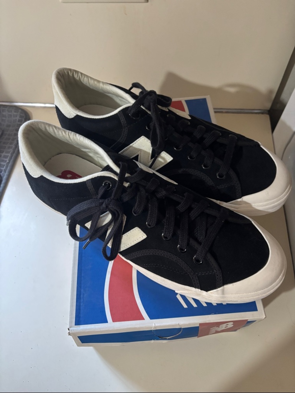 New Balance Black Suede Low-Top Sneakers with White Accents size 11